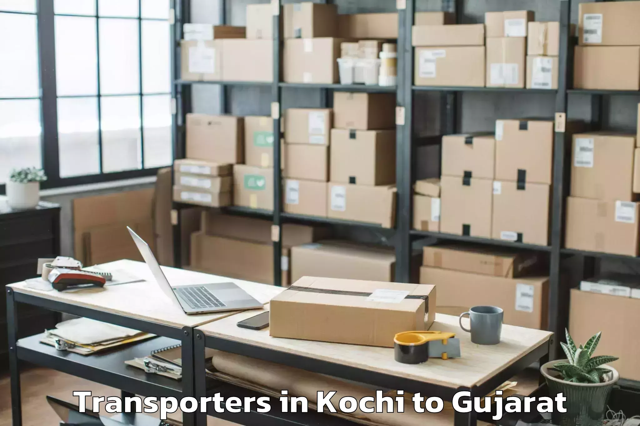 Book Your Kochi to Udhana Transporters Today